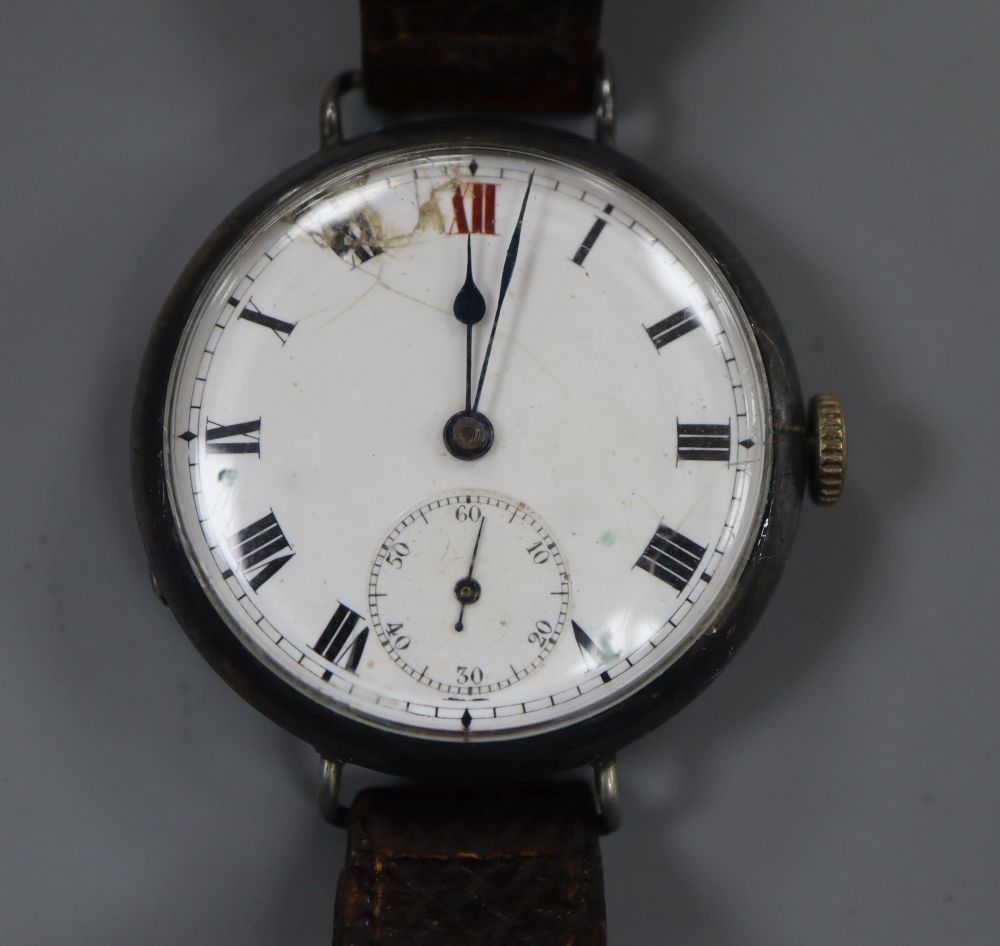 A gentlemans early 20th century silver manual wind wrist watch, the back inscribed B Squadron 1913 (a.f.).
